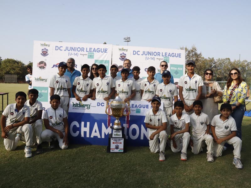 Baba Haridas Cricket Academy team with the DC Junior League 2021 trophy