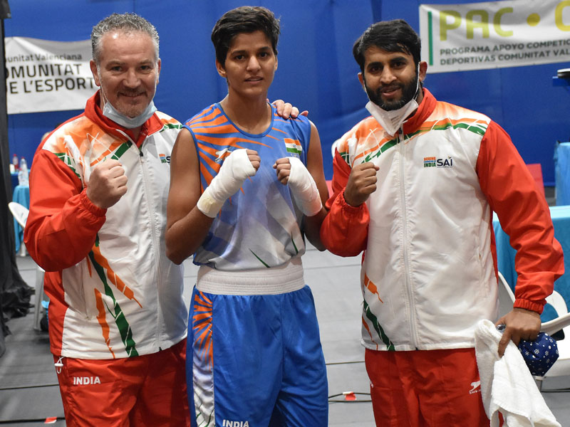 Jasmine with the coaches after her win.