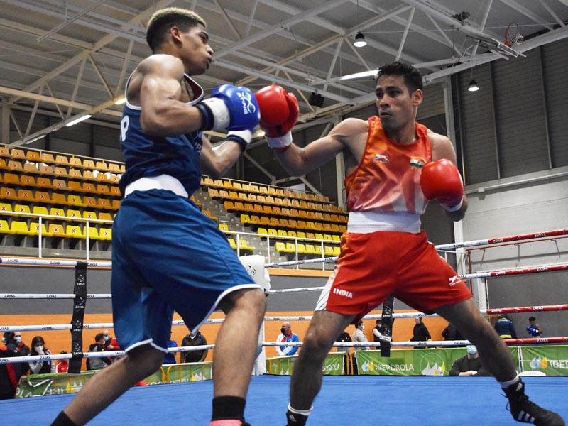 Mohd Hussamuddin red in action during his bout against Spains Juan Manuel Torres at the Boxam International Tournament