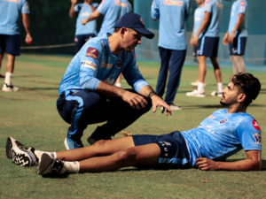 Delhi Capitals Head Coach Ricky Ponting speaks to batsman Shreyas Iyer during a training session