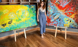 Artist Anita Goel with her works