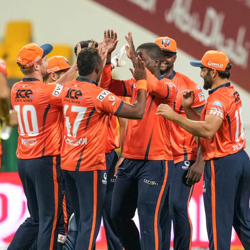 Delhi Bulls players celebrate a wicket