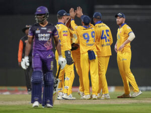 Team Abu Dhabi celebrate a wicket