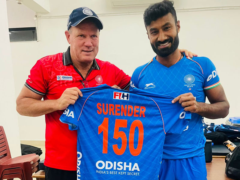 Graham hands Surender 150th match jersey