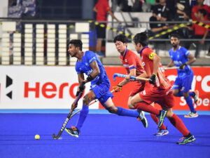 India Mens Hockey Team in action against Japan