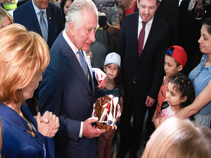 uks prince charles visits ukrainian refugees in romania