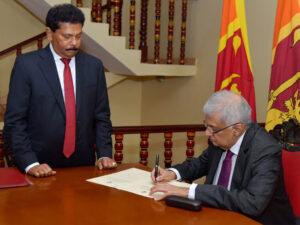 sri lankan prime minister sworn in as interim president