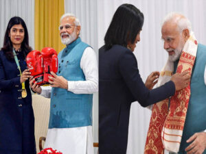 nikhat zareen gifts pm modi boxing gloves hima das gives traditional gamocha