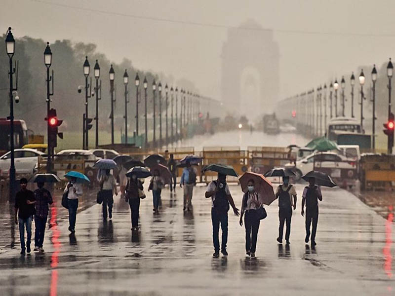 delhi rain temperature drop