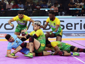 Patna Pirates with a tackle on Bengal Warriors