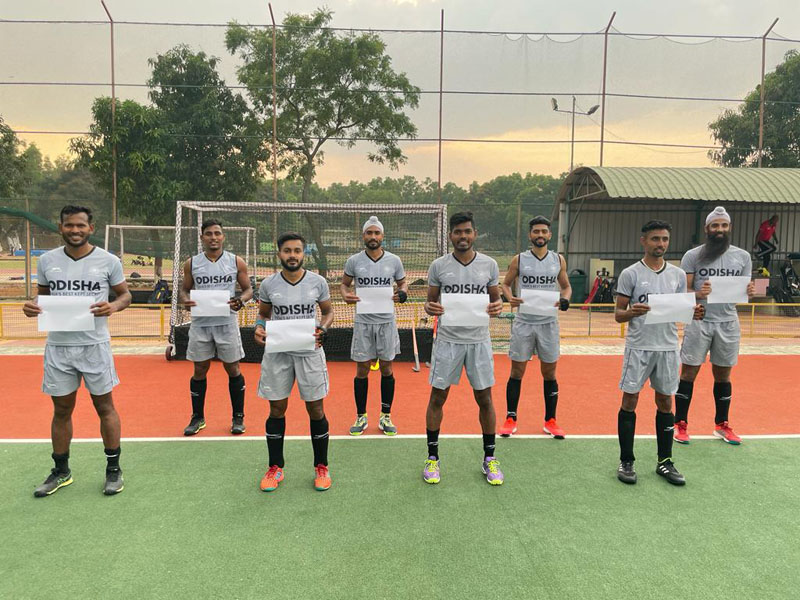 Indian Hockey players showcasing support to WhiteCard