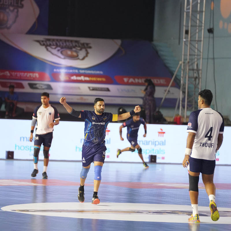 Captain of the Golden Eagles UP Vikas celebrates his goal against the Rajasthan Patriots