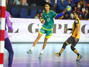 Naseeb Singh of Telugu Talons in action against Garvit Gujarat